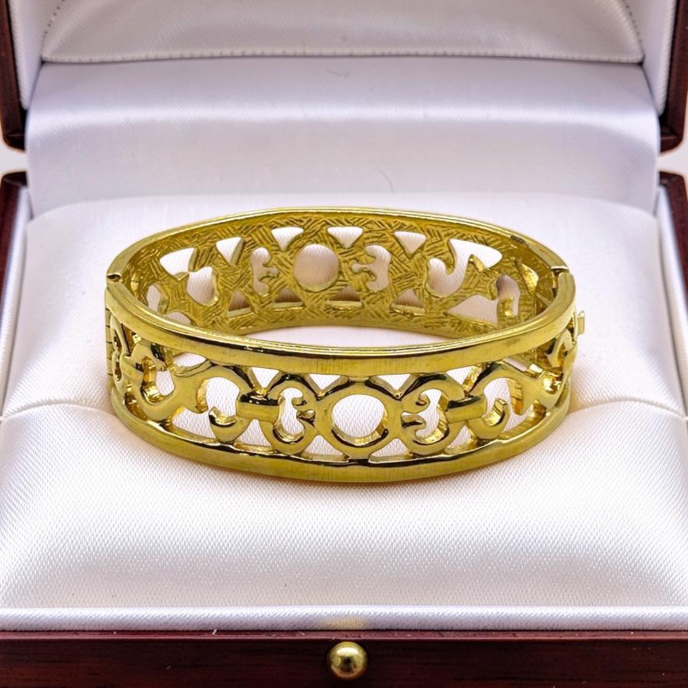 Signed GIVENCHY Vintage 80s Gold Tone Open Work Hinged Bangle Bracelet 7.5” EUC
